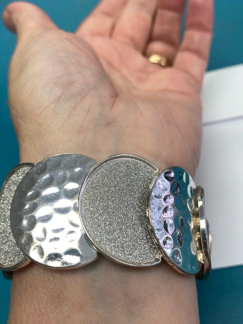 Silver Toned Hammered & Textured Disc Stretch Bracelet